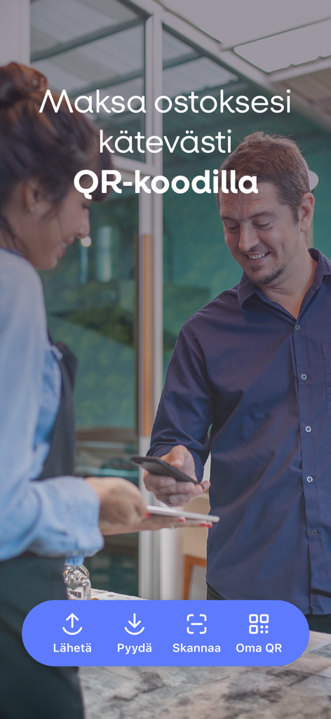 A man using the MobilePay app to pay with a QR code at a store counter