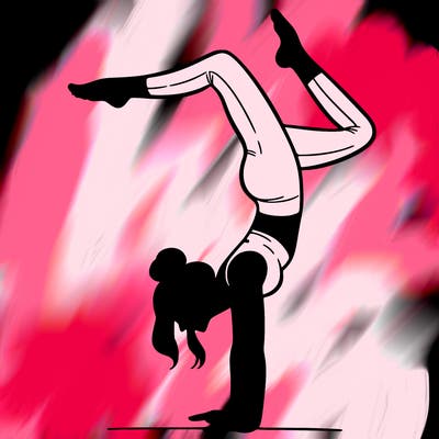 a woman doing a handstand