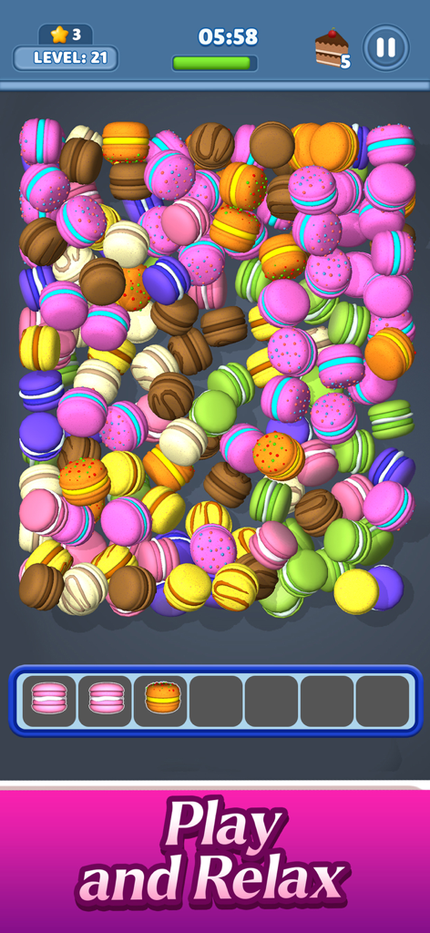 Screenshot of Match 3D Box Triple Match showing a relaxing puzzle with colorful 3D macarons