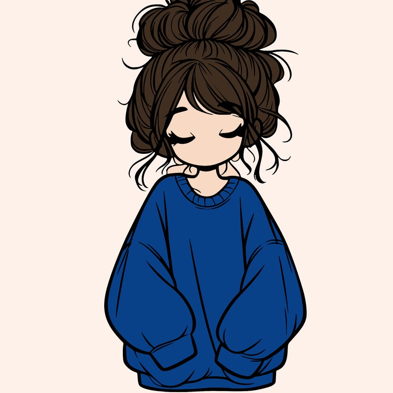 girl with baggy sweatshirt and messy bun