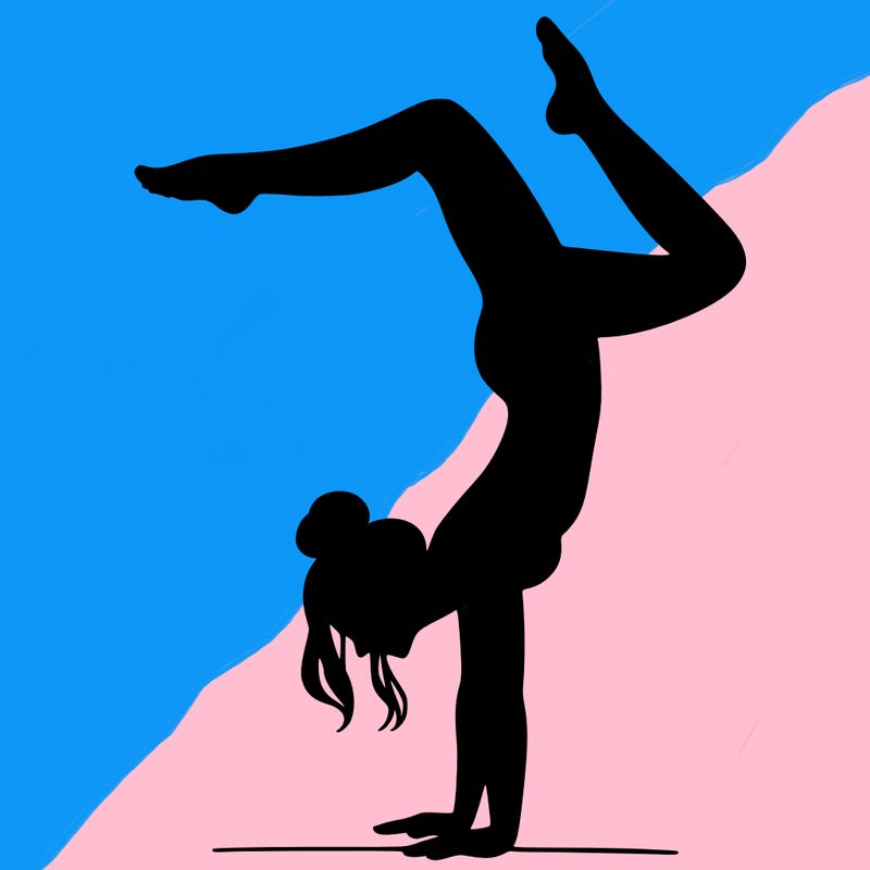 a woman doing a handstand