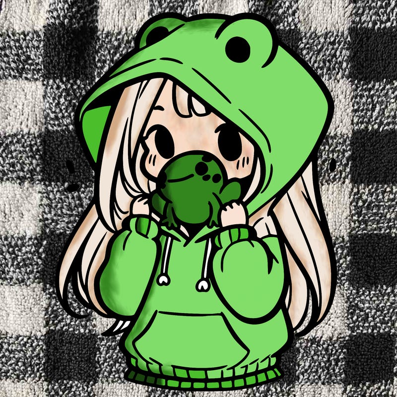 a girl holding a froggy hoodie