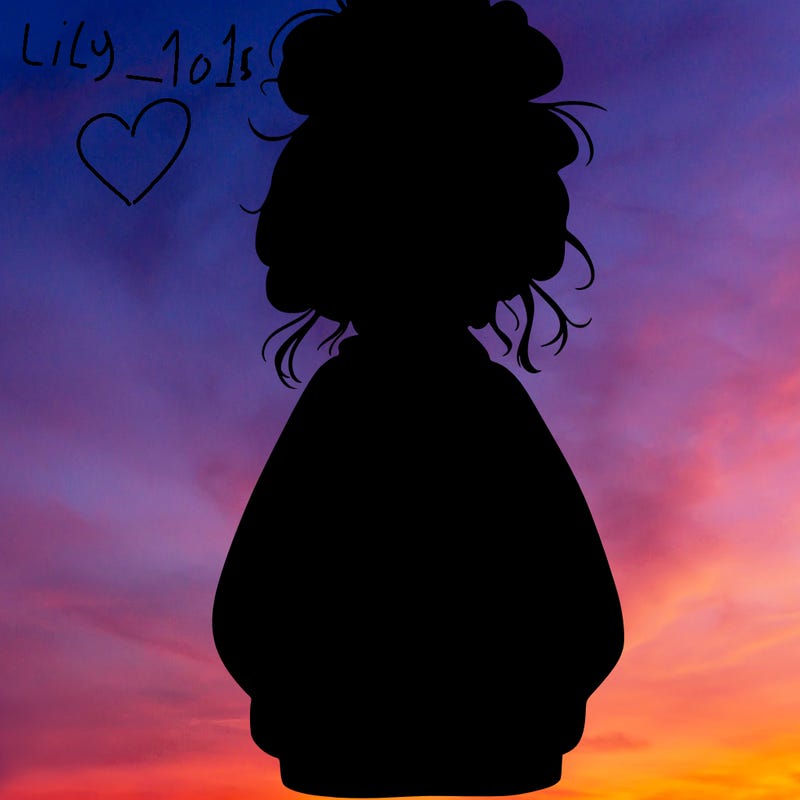 girl with baggy sweatshirt and messy bun