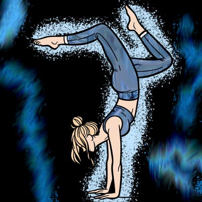 a woman doing a handstand