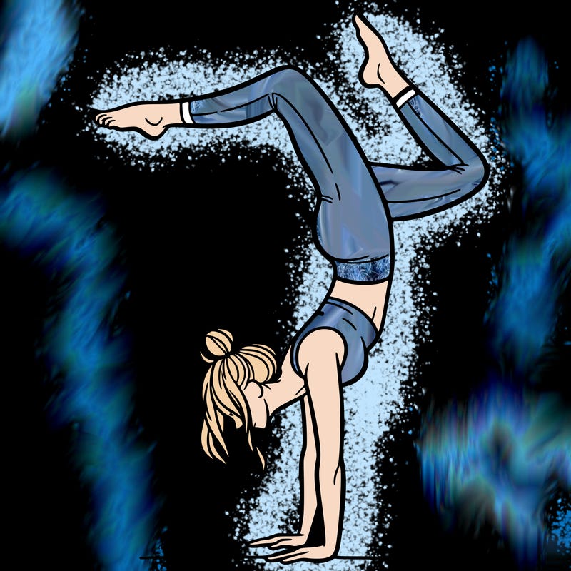 a woman doing a handstand