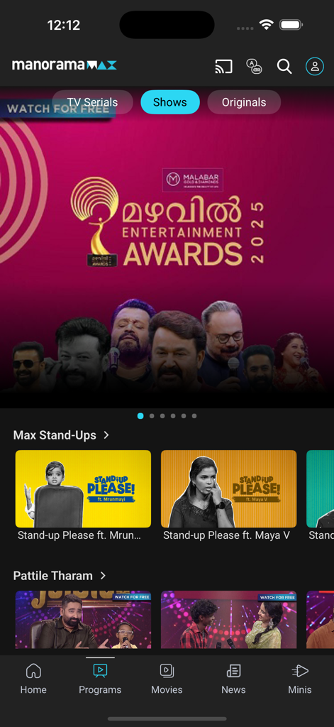 manoramaMAX - Malayalam Movies - Interface de l'application manoramaMAX montrant la catégorie des émissions avec une bannière pour les récompenses de divertissement et des miniatures de stand-up comedy.