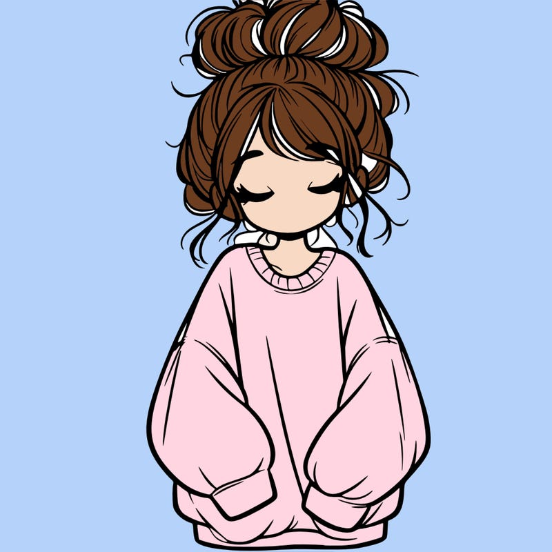 girl with baggy sweatshirt and messy bun