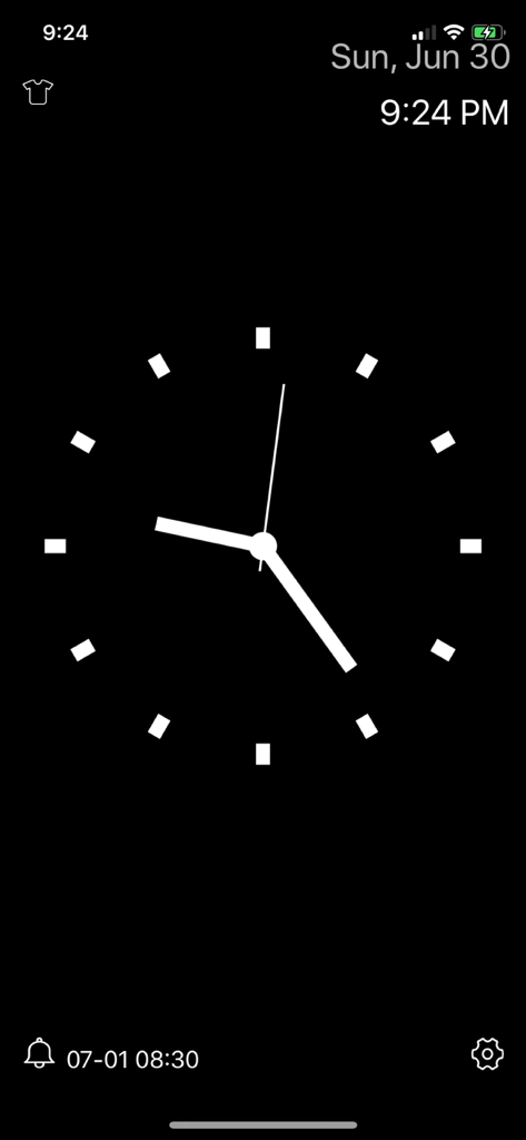 Desk Clock - Analog Clock Face - Esfera de reloj analógica minimalista en blanco sobre fondo negro que muestra la hora y la configuración de la alarma