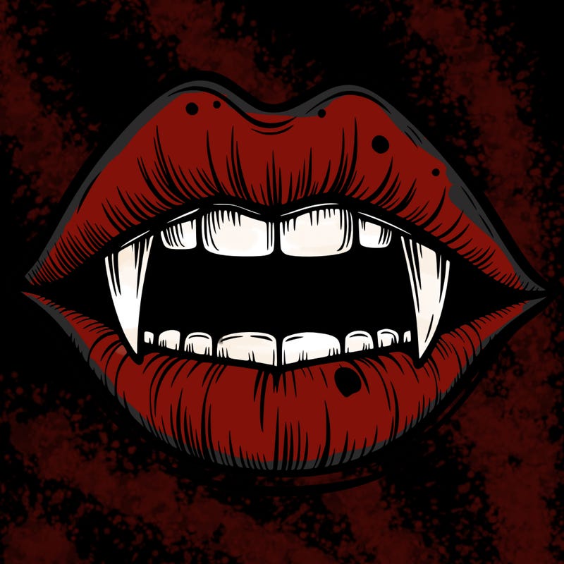lips with vampire teeth