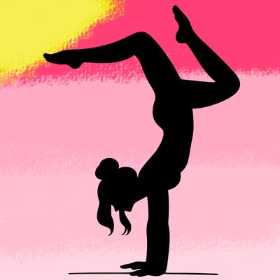 a woman doing a handstand