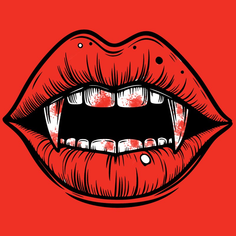 lips with vampire teeth
