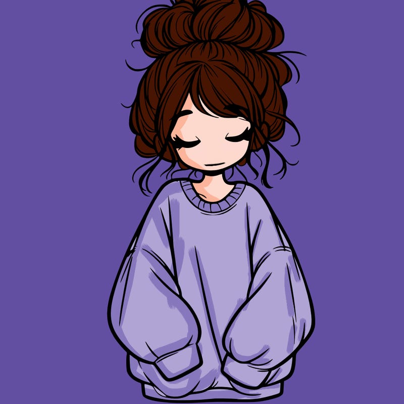 girl with baggy sweatshirt and messy bun