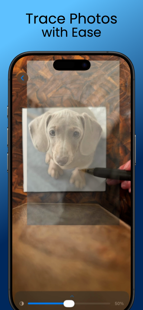 PhotoTrace: Camera Tracing - Interface of PhotoTrace app showing a puppy photo overlay for tracing on paper
