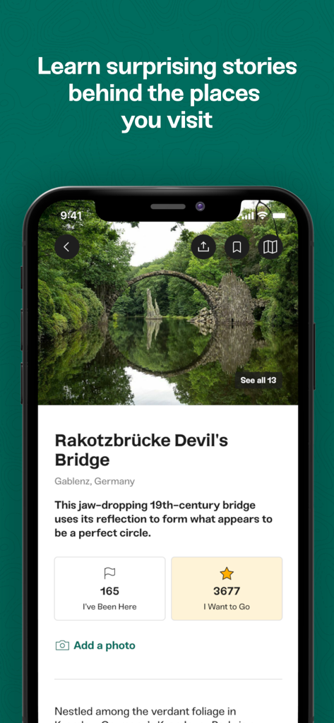 Atlas Obscura Travel Guide - Atlas Obscura app interface showing the historical Rakotzbrücke bridge in Germany with a detailed backstory and visitor statistics.