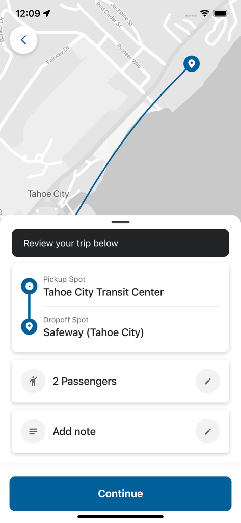 TART Connect - A trip review screen in the TART Connect app showing a ride request from Tahoe City Transit Center to Safeway for two passengers.