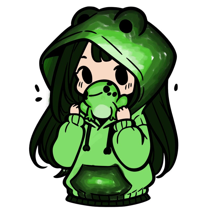 a girl holding a froggy hoodie