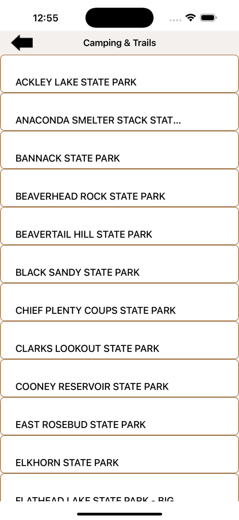 A mobile screen from the Montana State Parks Guide app showing a scrollable list of state parks for camping and trails