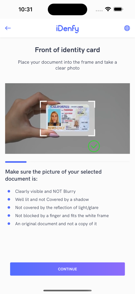 iDenfy Identity Verification - A hand holding a California driver license inside a white frame for identity verification on the iDenfy mobile app.