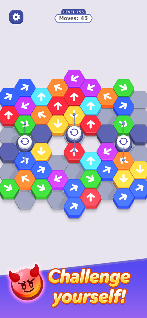 Hexa Away puzzle game screen showing colorful hexagonal tiles with arrows and a challenge yourself banner