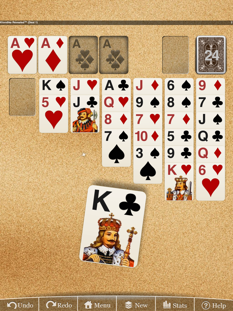 Jugabilidad clásica de Klondike solitaire en Erics Klondike Sol HD Lite sobre un fondo de tablero de corcho.