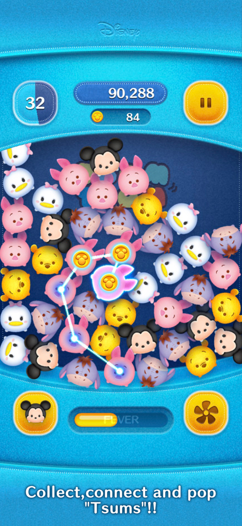 Una captura de pantalla del juego LINE Disney Tsum Tsum que muestra varios personajes de Disney conectados en una cadena de puzzles.