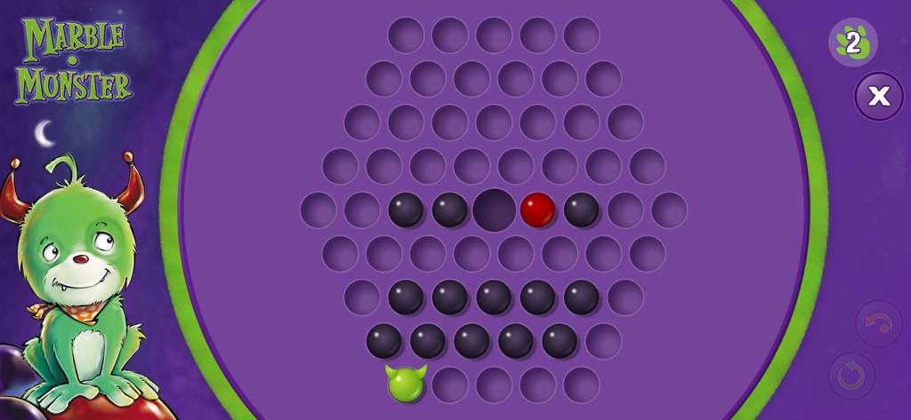 Marble Monster - A gameplay screen of Marble Monster showing a purple hexagonal board with black marbles and one red marble