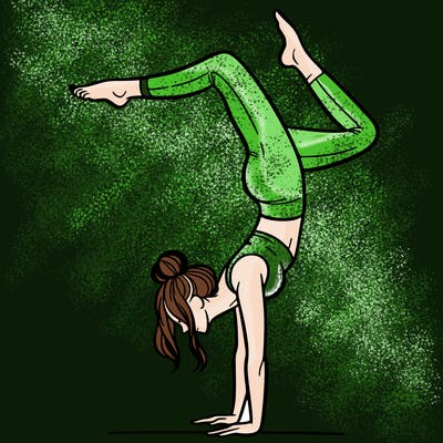 a woman doing a handstand