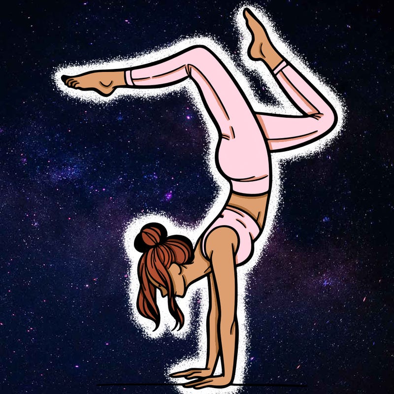 a woman doing a handstand