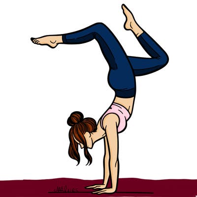 a woman doing a handstand