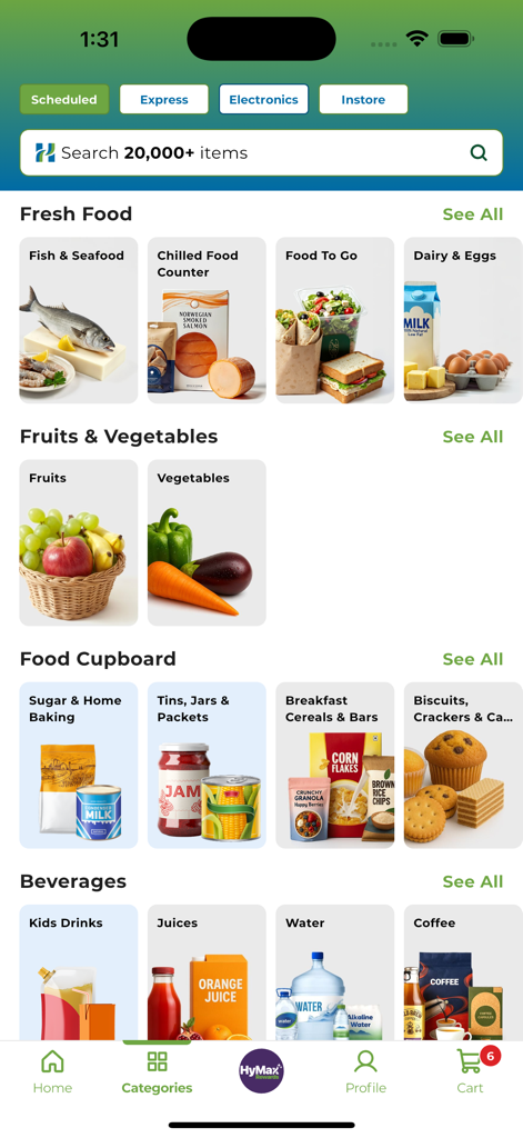 HyperMax - Mobile interface of the HyperMax app showing grocery shopping categories including fresh food fruits and beverages