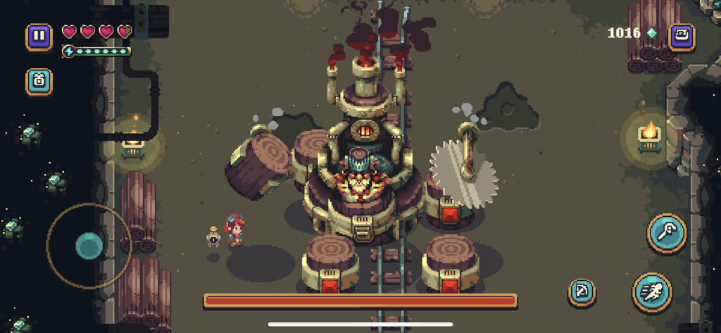 Sparklite - A top-down view of a character facing a large mechanical boss in the pixel art game Sparklite.