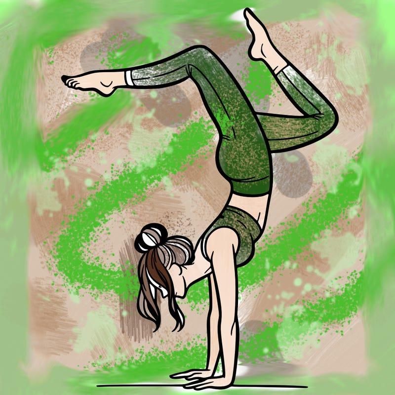 a woman doing a handstand