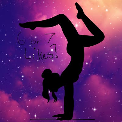 a woman doing a handstand