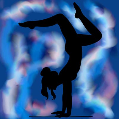 a woman doing a handstand