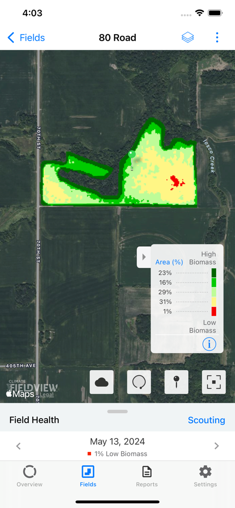 Climate FieldView™ - Vista de mapa satelital en la aplicación Climate FieldView que muestra un análisis codificado por colores de la salud de la biomasa de un campo agrícola.