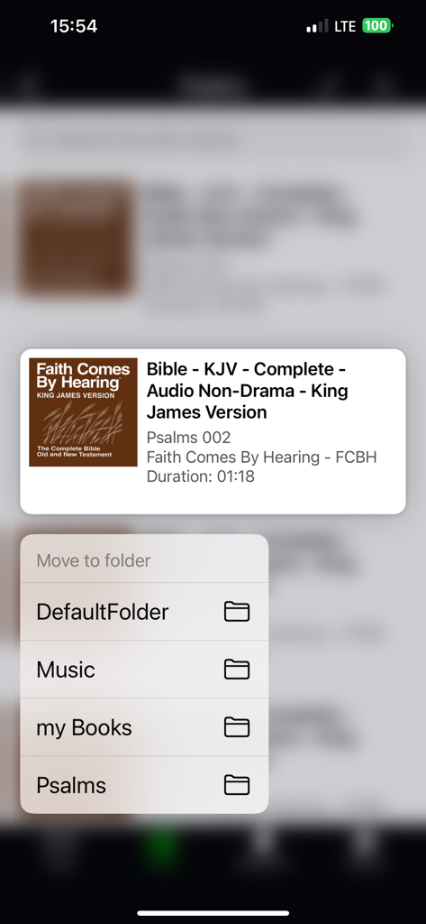 Player for Audiobooks & Music - Interfaz de aplicación móvil que muestra opciones para mover audiolibros a diferentes carpetas para su organización.