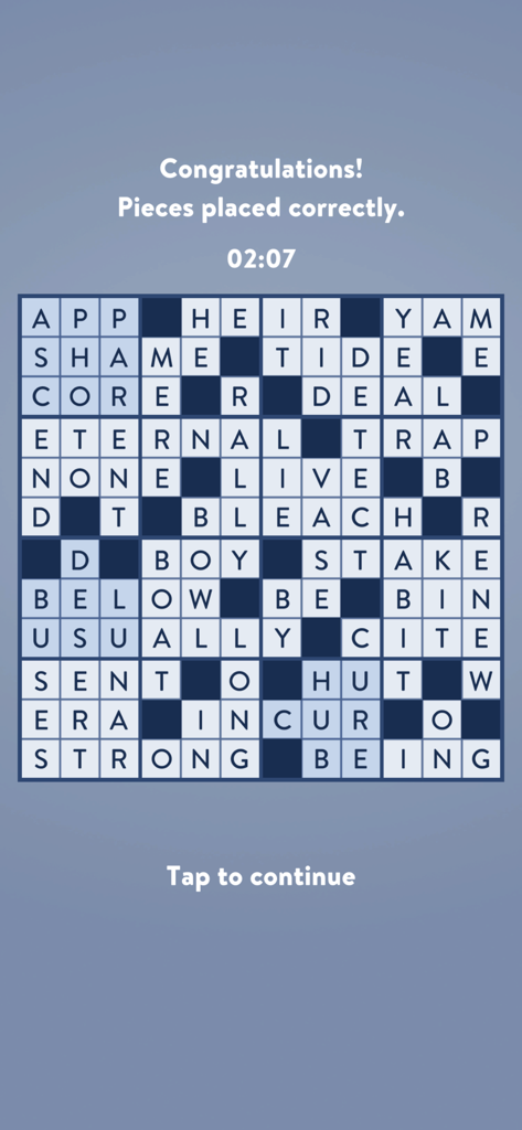 Word Mosaic - A solved crossword puzzle grid in the Word Mosaic app with a congratulations message.