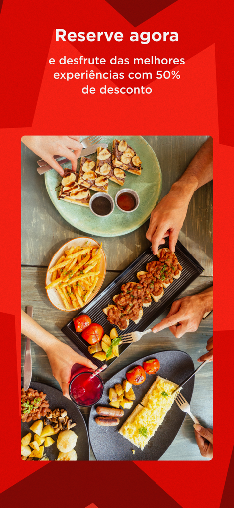 Friends sharing a variety of dishes at a restaurant with a 50 percent discount offer