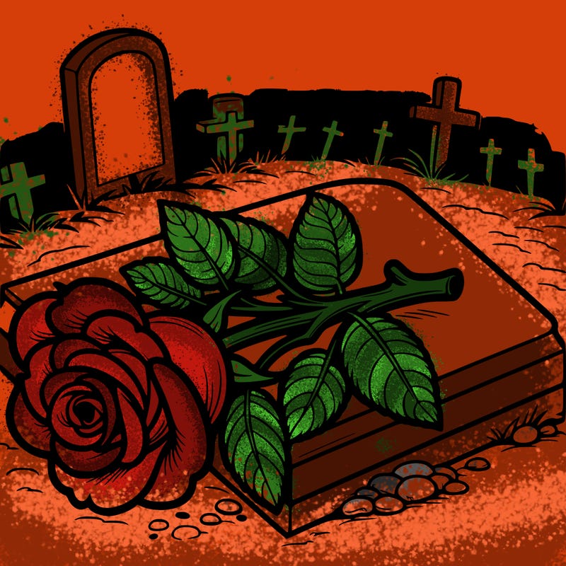 a single rose laying on a grave