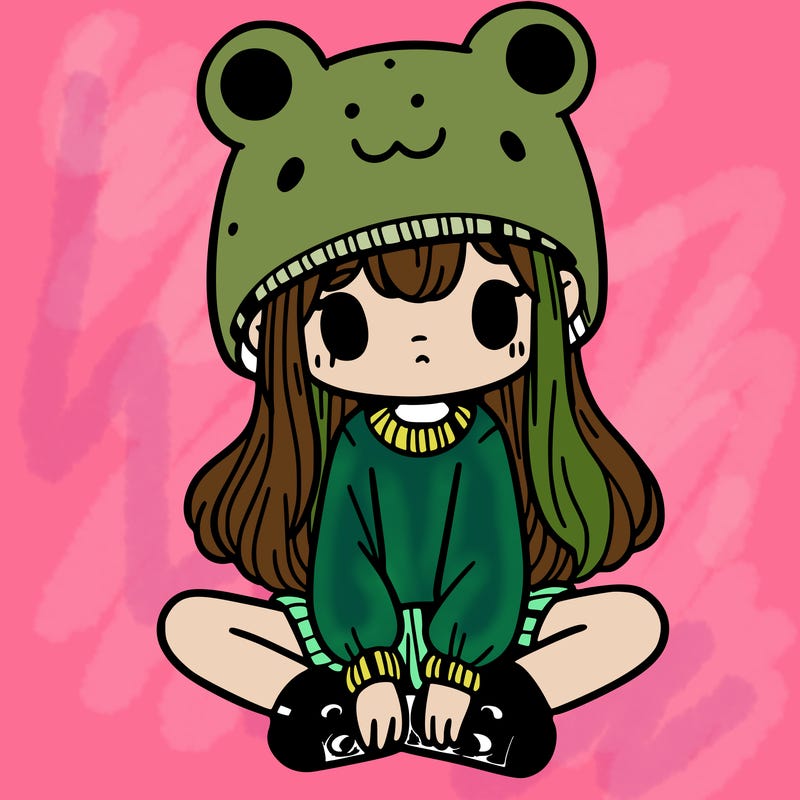 a girl wearing a frog hat and some frog socks