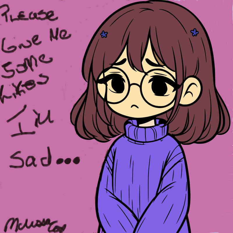 sad girl with glasses in a sweater