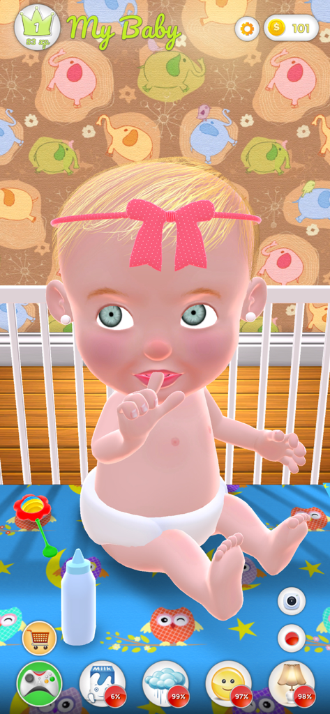 A virtual baby girl in a crib with interactive care icons for feeding and bathing