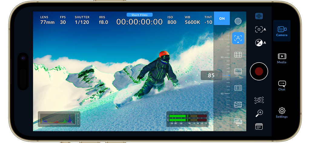 Blackmagic Camera app interface displaying professional video controls and a snowboarder on a mountain