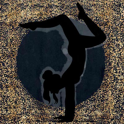a woman doing a handstand