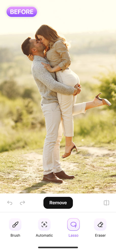 A screenshot of the Magic Eraser app showing a photo of a couple with editing tools like Lasso and Eraser for object removal