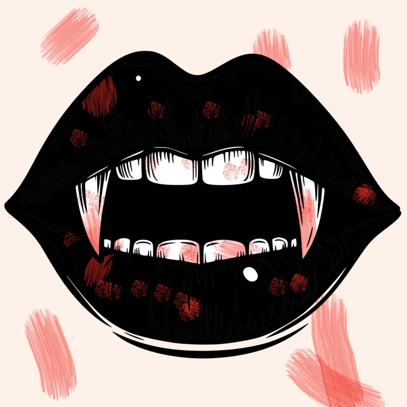 lips with vampire teeth