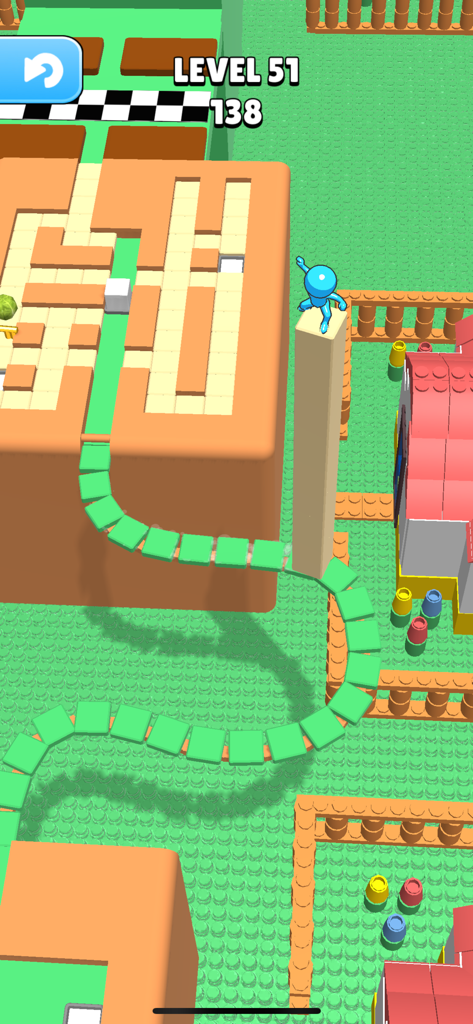 A blue character standing on a tall stack of tiles while navigating a 3D green maze in Stacky Dash