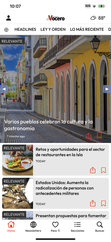 Pantalla de inicio de la aplicación de noticias El Vocero de Puerto Rico que presenta titulares locales y noticias culturales.