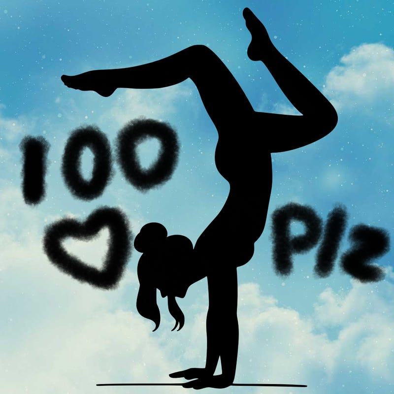 a woman doing a handstand