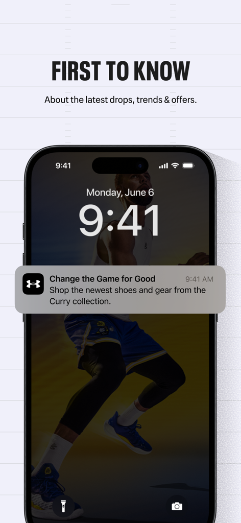 A mobile phone lock screen showing a notification for new product drops from the Under Armour app